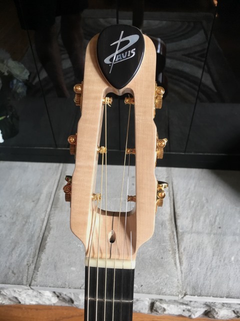 The custom head stock of the 2020 Dan Davis Acoustic Ballo Guitar.